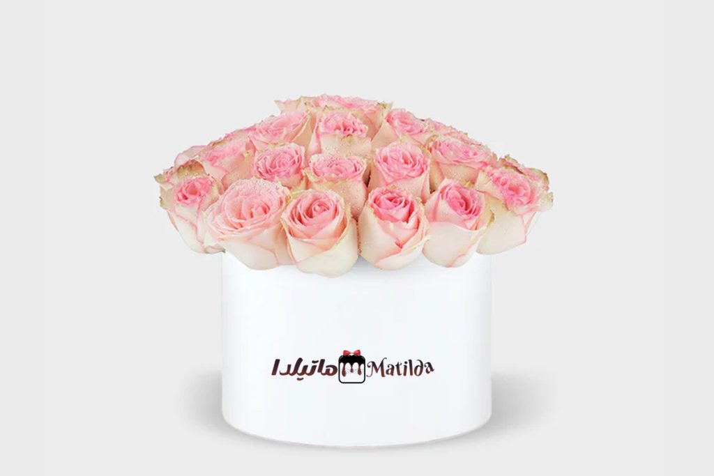 Luxury Pink Roses Box with vibrant blush-pink roses in a modern white box, for same-day flower delivery in Dubai.
