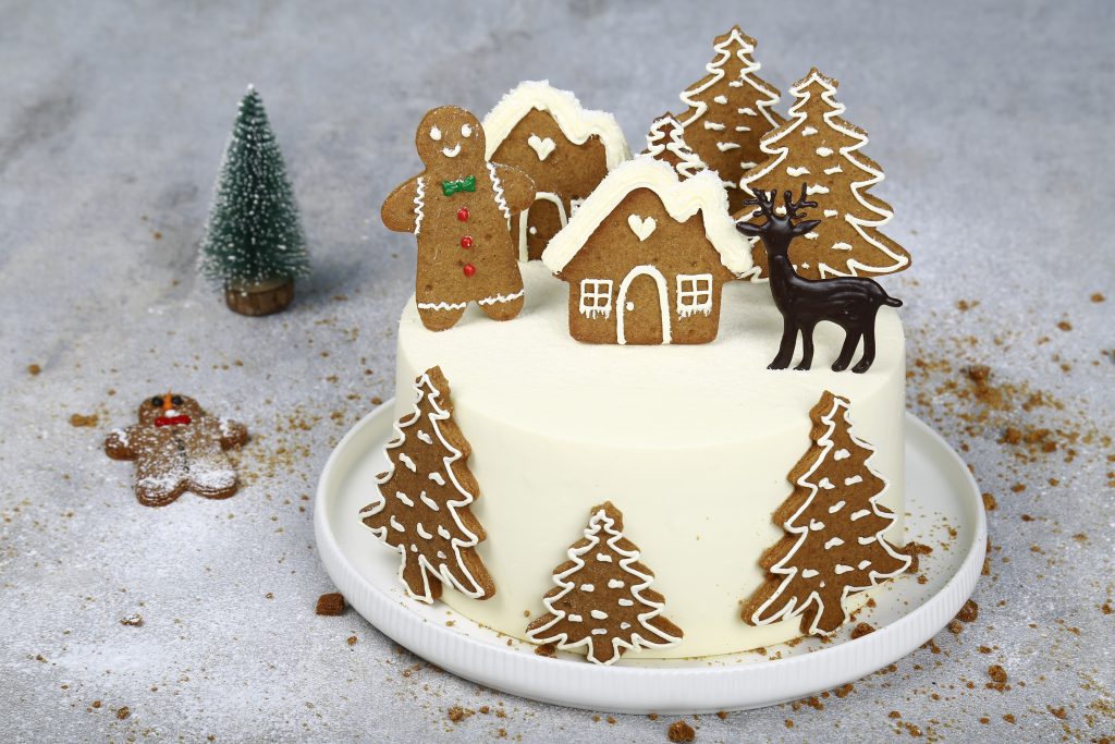 Close-up showing the layers of gingerbread, vanilla cake, and frosting