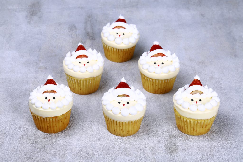 Close-up of the Vanilla Chocolate Santa Cake with Santa design